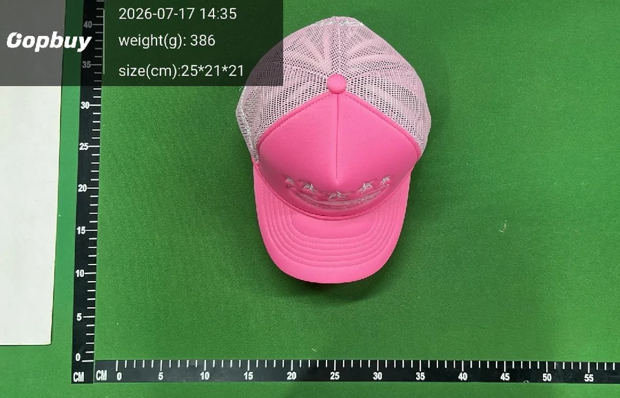 Oopbuy QC photo of a pink trucker cap on a green ruler mat with weight and size overlay