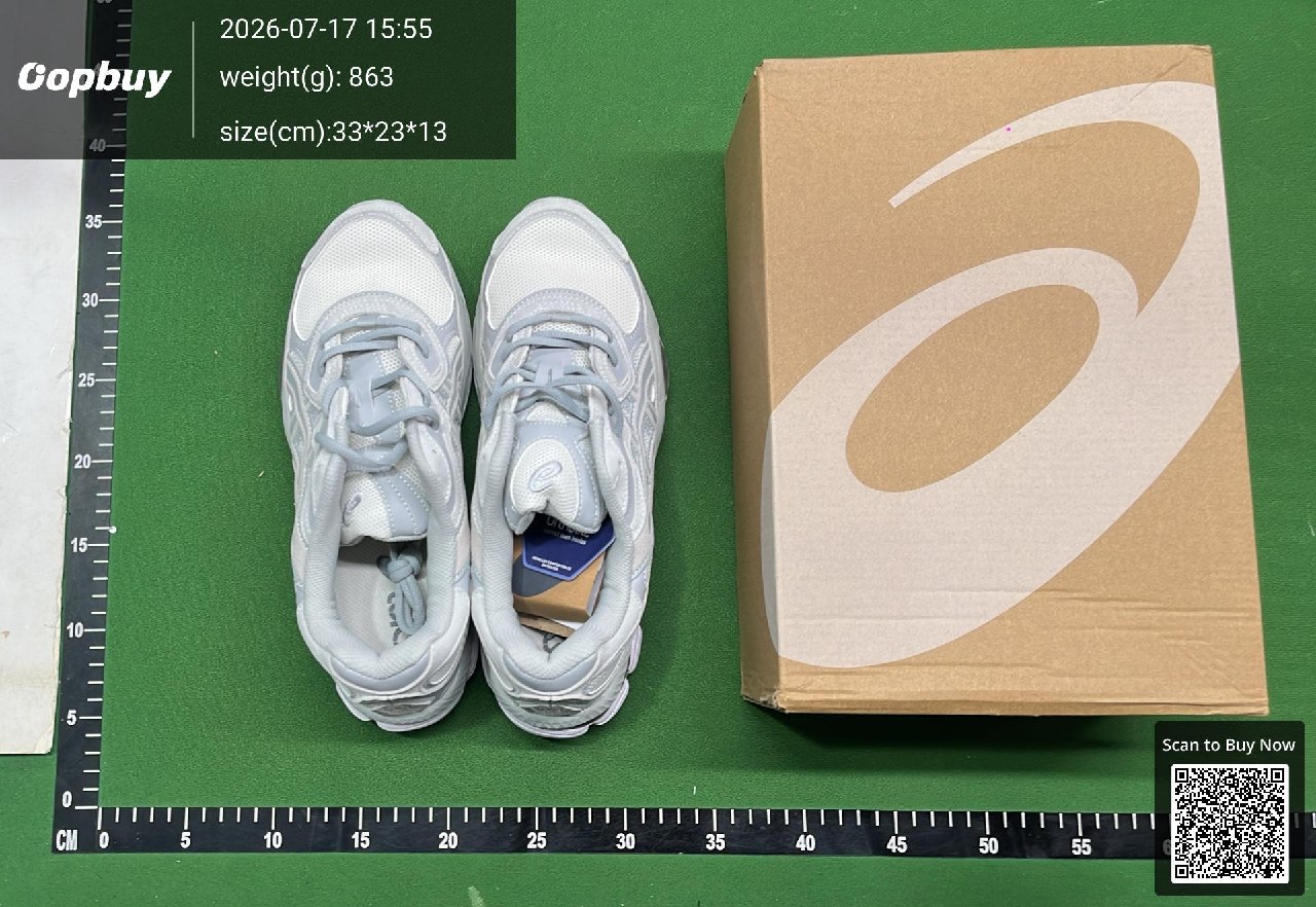 Grey shoes and their box in a warehouse inspection photo